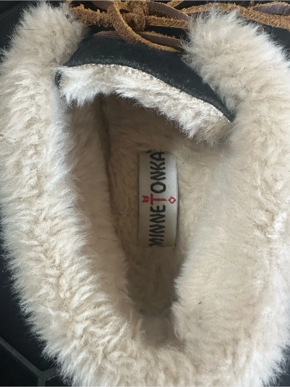 Minnetonka Black Moccasin Slippers with Cream Faux Fur Trim